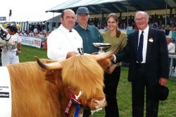 We donated a trophy, made by silversmith Martyn Pugh using Highland horn, to the Three Counties Show in Malvern. The trophy is awarded to the best Highland cattle. Chase and I present it for the first time.