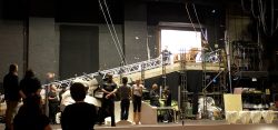Ross about to come down the ramp for the first time with the Chrysler Imperial and actors on the stage.