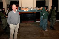 As the funeral procession gets ready to walk into the Manchester Opera House, Stephen Ware (the veterinarian) poses with the Entered Novitiate from theCremaster 3film.