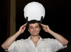 The metal screws now go through the sun disk so it won't (hopefully) fall off of Ross' head.
