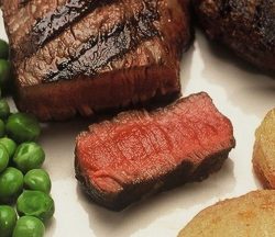 I personally think the best way to cook a Scottish | Kobe sirloin steak is on the grill, with a bit of ground pepper and ground sea salt. This piece of steak is served with garden peas and potatoes. We grow our own potatoes at Lucies Farm and I'm amazed at how different they taste from "store bought" potatoes.