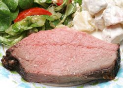 This delicious medium-rare piece of cold roast beef (with some freshly ground salt) is Scottish | Kobe top rump roast. Marjorie cooked it at a low temperature for a long time, using her trusty meat thermometer. A bit of green salad, some red potato salad --- and I'm a happy camper. I love taking these photographs, as I then get to eat the props.