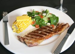 Coooked medium rare, with some fresh corn on the cob with a pat of Alderney Island butter (from Guernsey cows) and a fresh salad.